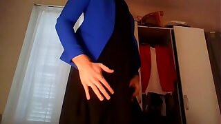 Young unskilful cross dresser secretary teasing and masturbating in red hot trench, sexy titillating blazer and beautiful black dress